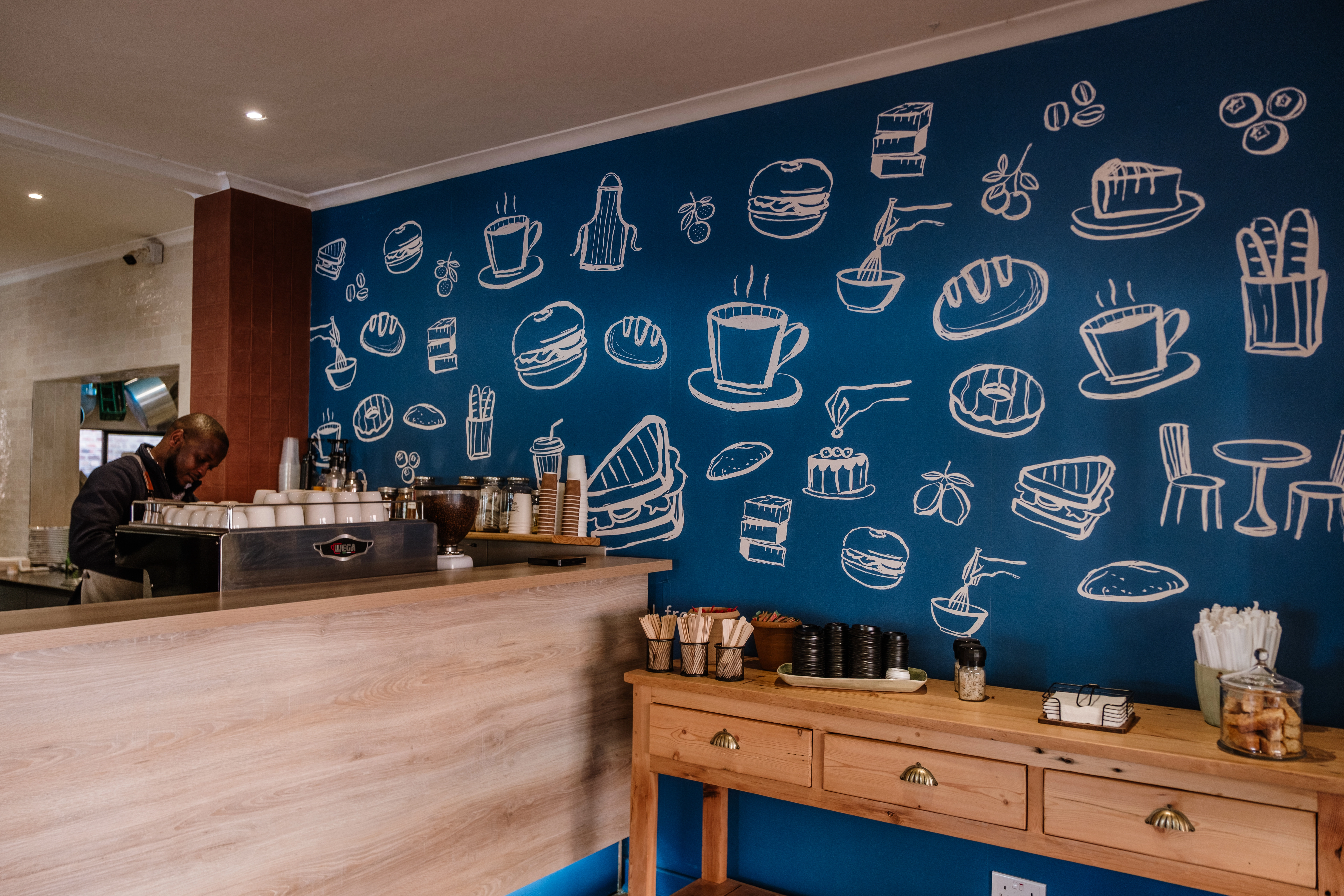 Fresh baked goods display featuring breads and pastries at Alfresco