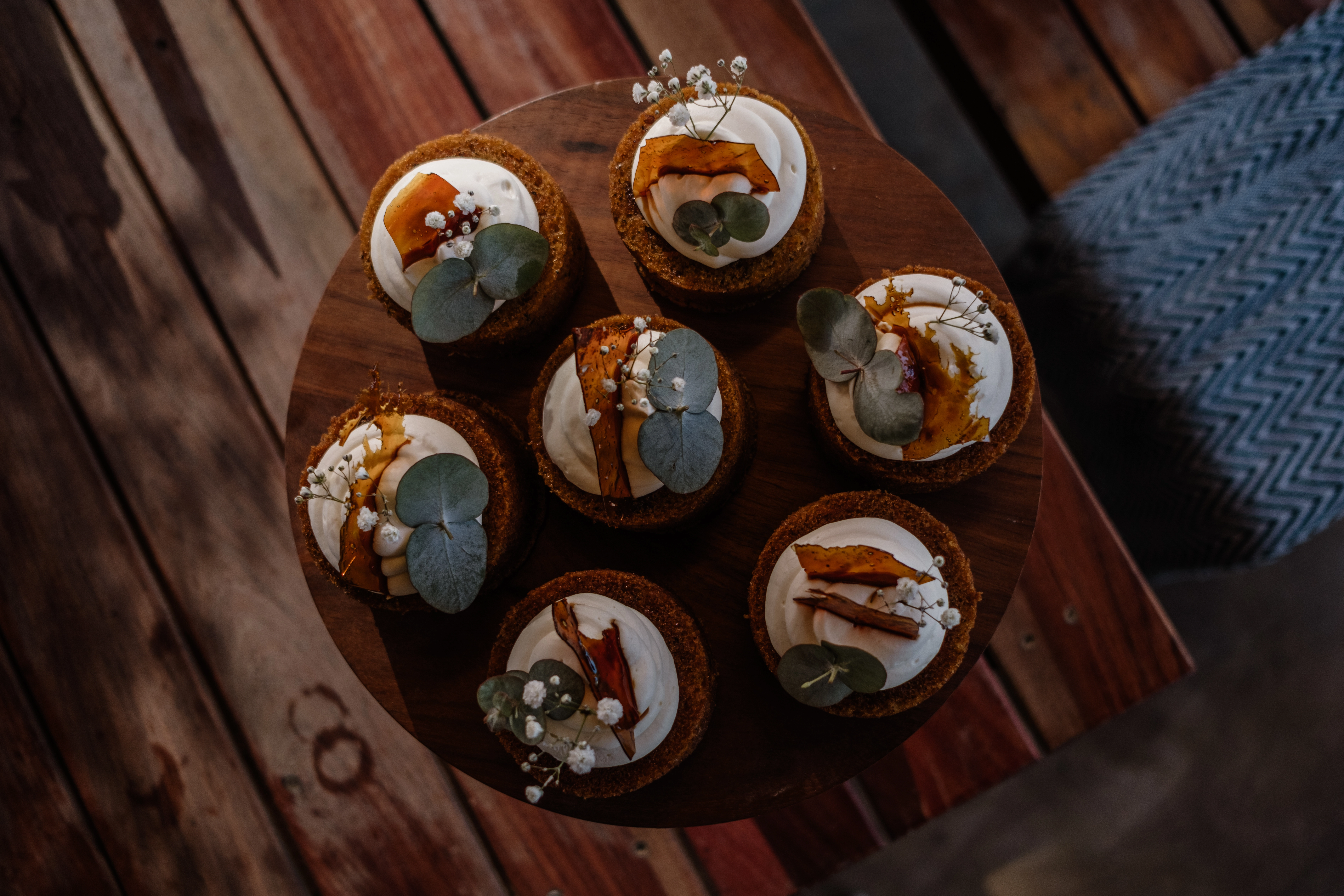 Mini cakes arranged on table with aesthetic styling
